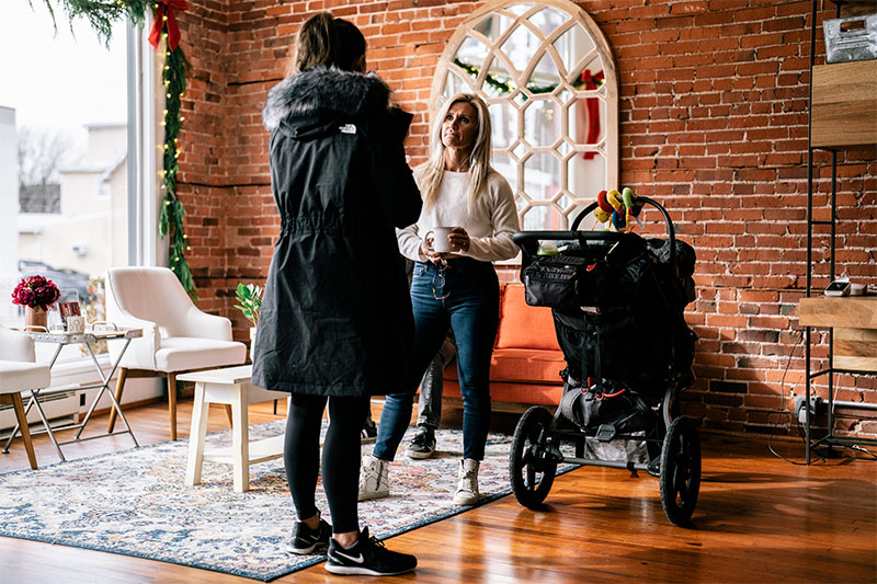 Physical therapist using Infrared Video Goggles to perform an oculomotor exam on a patient.