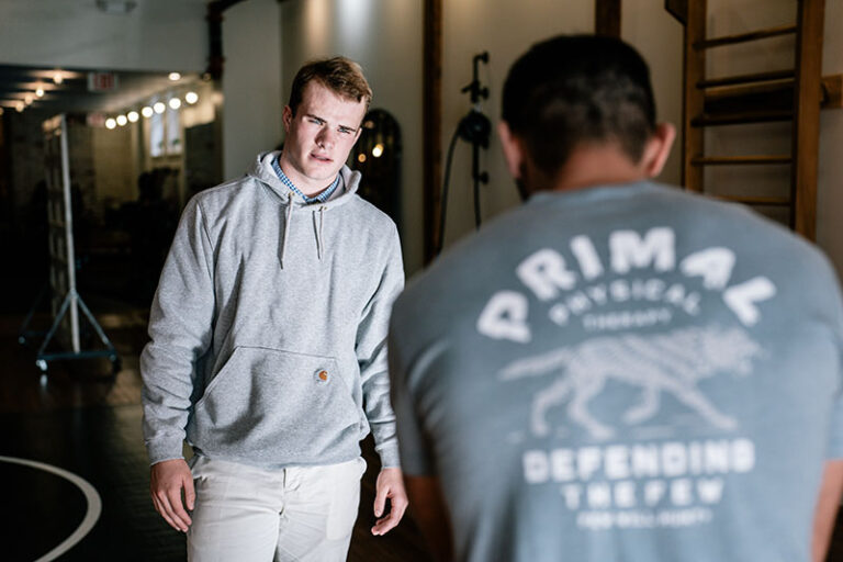 Patient performing gaze stabilization exercises by focusing on a target while moving their head.